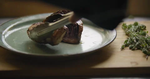 Meat placed on a plate on display Stock Footage 274652269