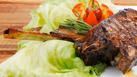 Meat plate on wooden table Video stock 88920504