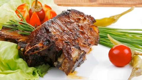 Meat plate on wooden table Video stock 88920566