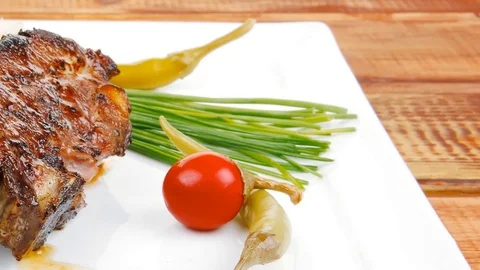 Meat plate on wooden table Video stock 88920665