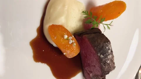 Meat with polenta on the plate Stock-Footage 232047938