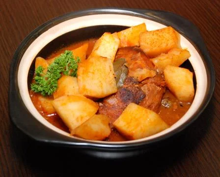 Meat with potatoes Stock Photos
