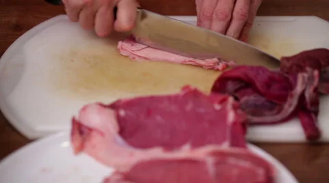 Meat preparation - chopping beef fat with sharp knife Stock Footage 44727221
