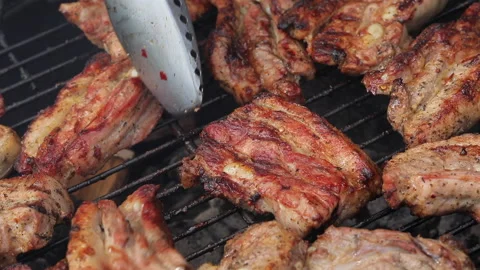 Meat preparing on grill Stock Footage 155484712