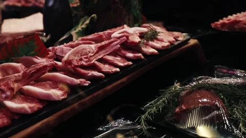 Meat products on the counter in the store Stock Footage 232610056