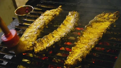 Meat ribs, roasted on the grill, brush with sauce Stock Footage 84252804