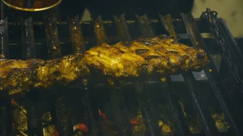 Meat ribs, roasted on the grill, brush with sauce Stock Footage 84252876