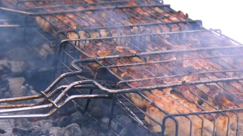 The meat is roasted on the barbecue Stock Footage 88773515