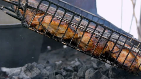 The meat is roasted on the barbecue Stock Footage 88774092