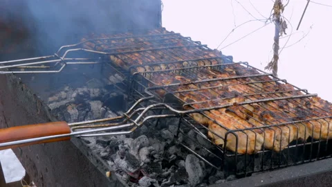 The meat is roasted on the barbecue Stock Footage 88774319