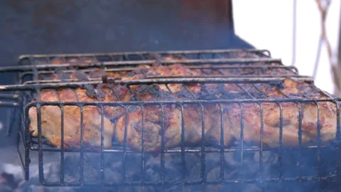 The meat is roasted on the barbecue Stock Footage 88774513
