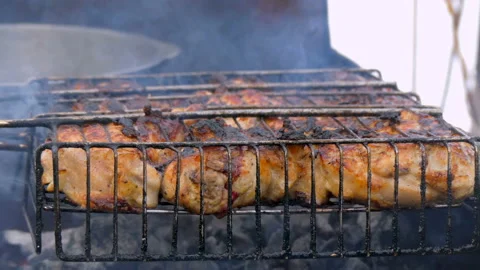 The meat is roasted on the grill Stock Footage 88773719