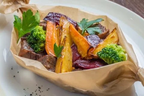 Meat roasted with potatoes Stock Photos