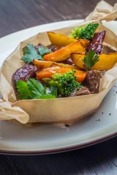 Meat roasted with potatoes Stock Photos