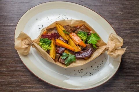 Meat roasted with potatoes Stock Photos