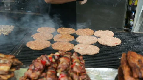 Meat roasting on grill Video stock 96640858