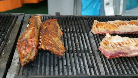 Meat roasting on grill Video stock 96641479