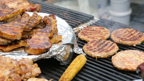 Meat roasting on grill 库存影片 96643168