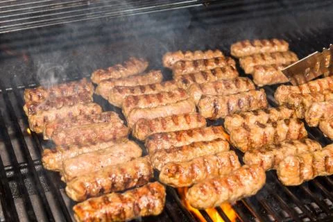 Meat rolls on the grill Stock Photos