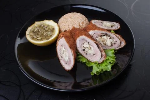 Meat rolls on lettuce leaf. Stock Photos