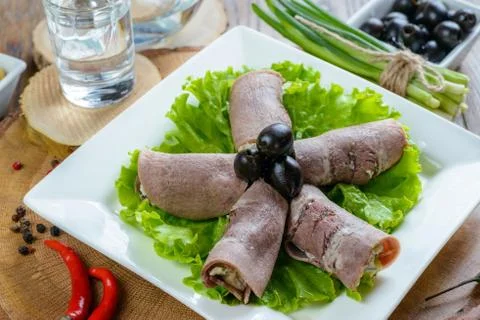 Meat rolls with olives Stock Photos