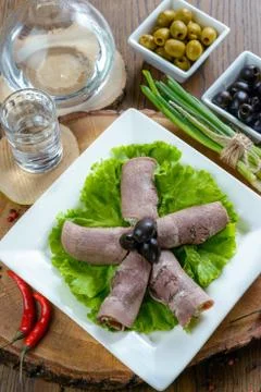 Meat rolls with olives Stock Photos