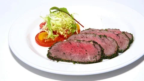 Meat with salad on plate Stock-Footage 74954044