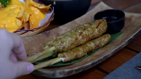 Meat satay roll on sugar cane Malaysian style Stock Footage 158443903