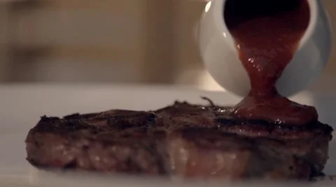 Meat with sauce in slow motion Stock Footage 67857277