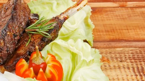 Meat savory on wooden table Video stock 88920997