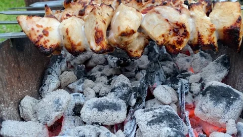 The meat is slowly fried on coals Video stock 157426413