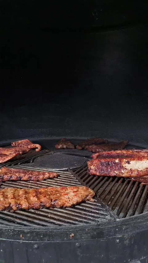 Meat spinning on grill Video stock 326212209