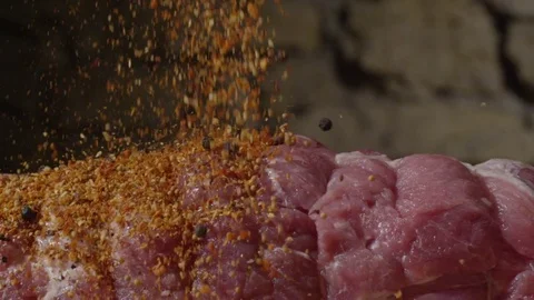 The meat is sprinkled with spices Stock Footage 73001669