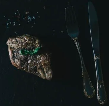 Meat Steak And Basil Stock Photos