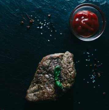 Meat Steak And Basil Foto stock