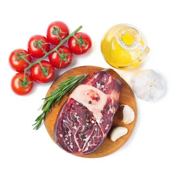 Meat steak and cooking ingredients isolated on whtie background. Stock Photos