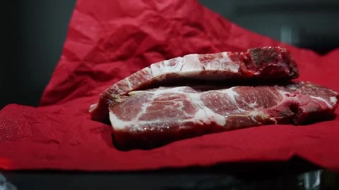Meat steak beef pork red background restaurant recipe Stock Footage 302808972