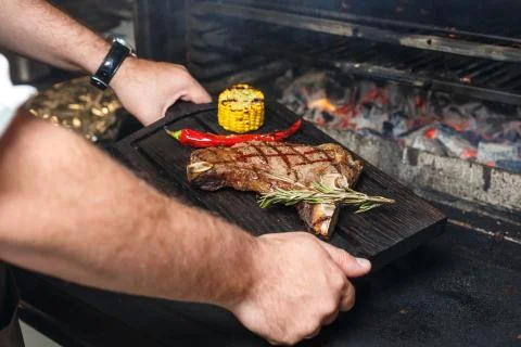 Meat steak on the board Stock Photos