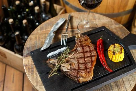 Meat steak on the board Stock Photos