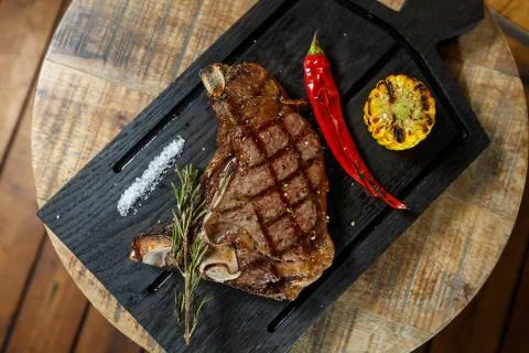 Meat steak on the board Stock Photos