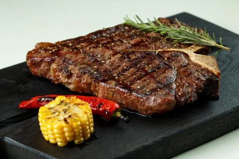 Meat steak on the board Stock Photos
