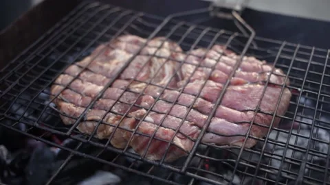 Meat steak on the grill. Stock Footage 152233385