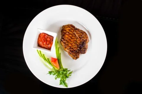 Meat  steak with vegetables Stock Photos