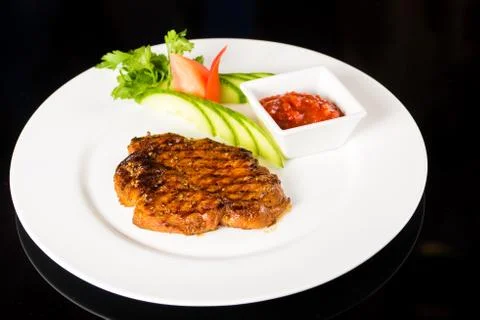 Meat  steak with vegetables Stock Photos