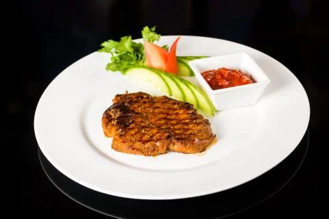 Meat  steak with vegetables Stock Photos