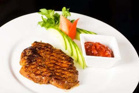 Meat  steak with vegetables Stock Photos