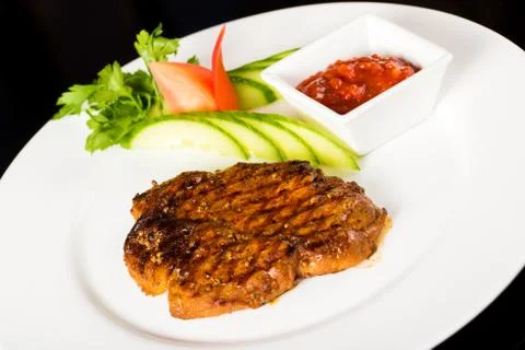 Meat  steak with vegetables Stock Photos