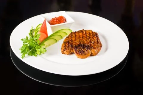 Meat  steak with vegetables Stock Photos