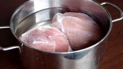 Meat steeped in a pot with water Stock Footage 48732547