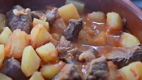 Meat stew with tomato sauce and potatoes (2) Stock Footage 294589073
